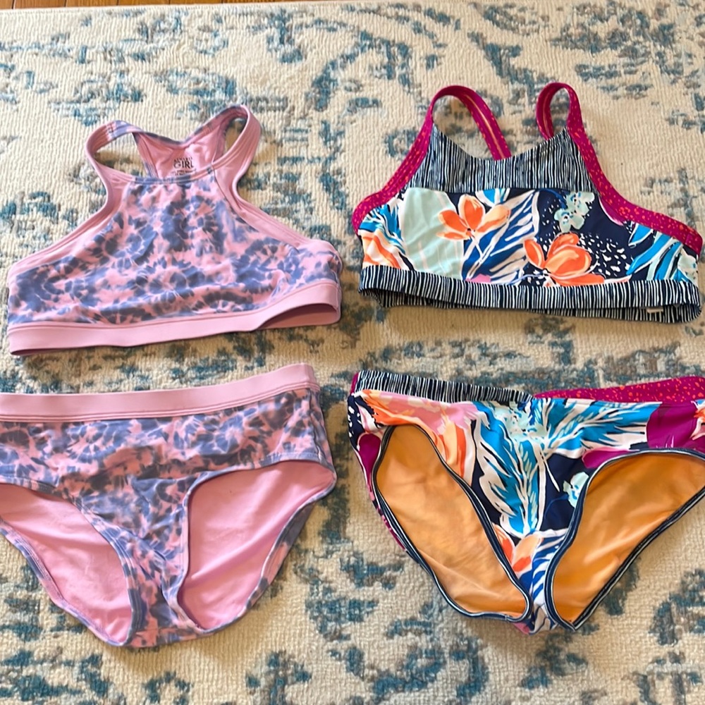 Athletic girl two pack bikinis